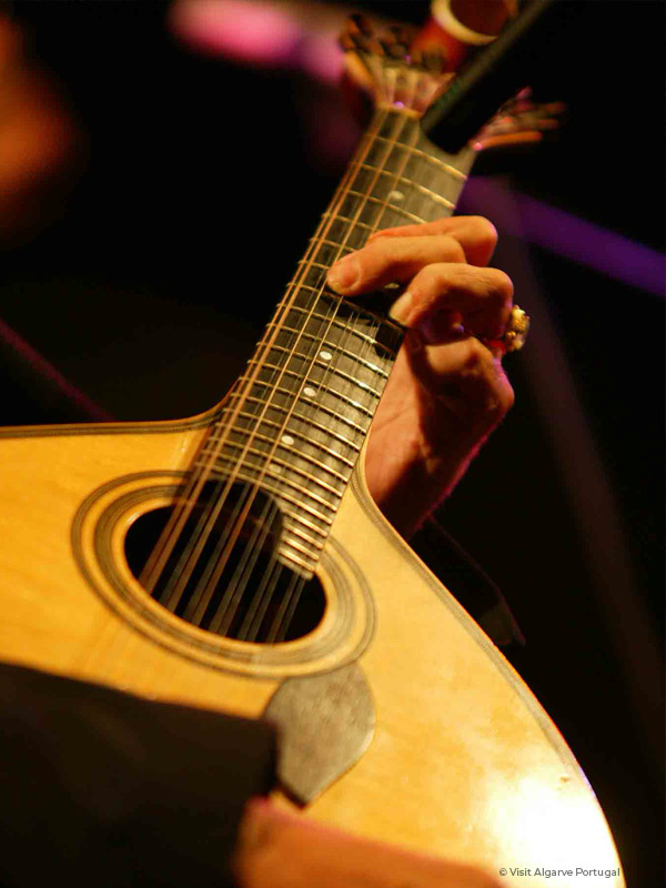 Typical fado guitar in close-up.