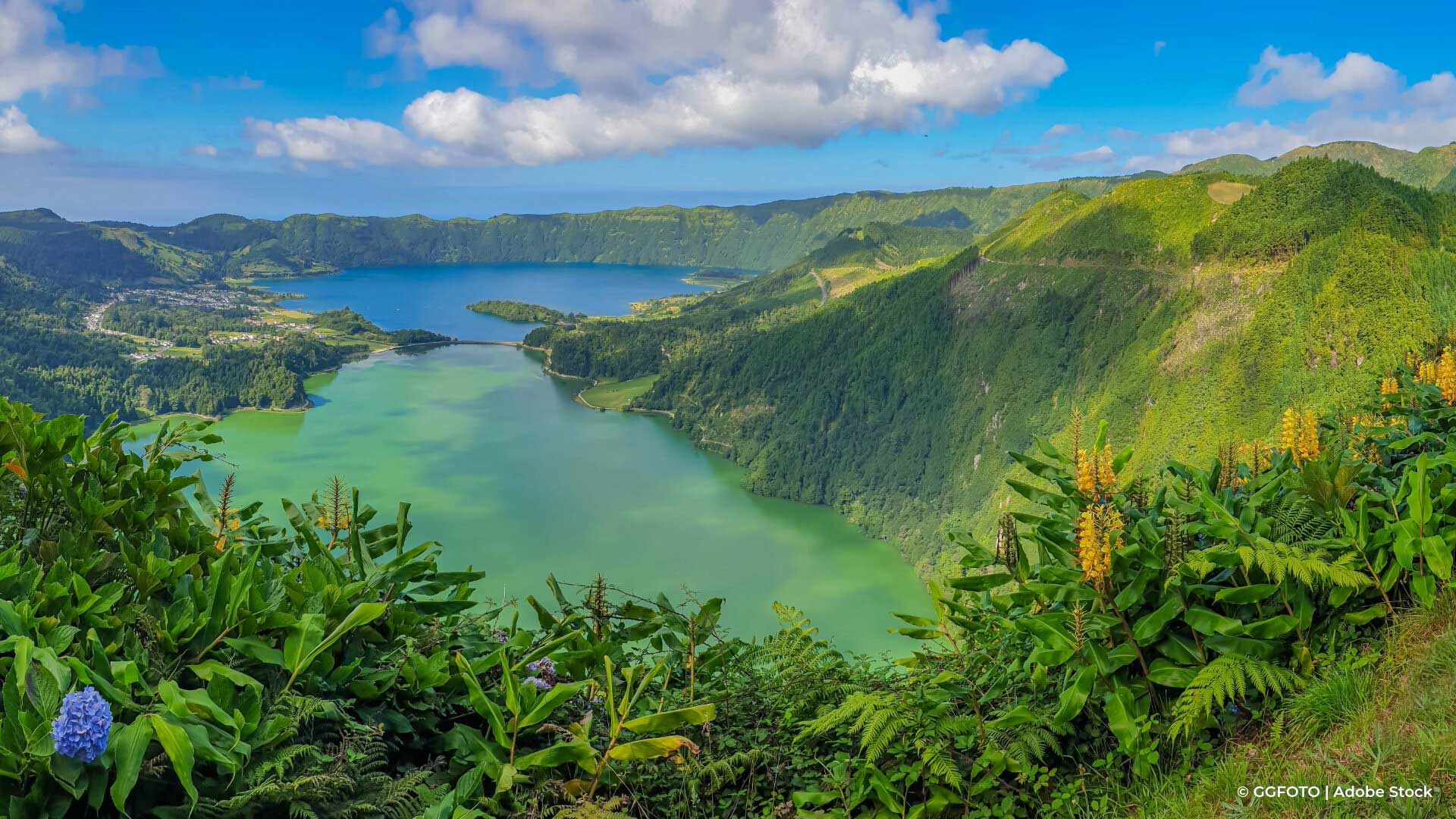 Sao Miguel island in the Azores with green hills, lakes and vegetation.